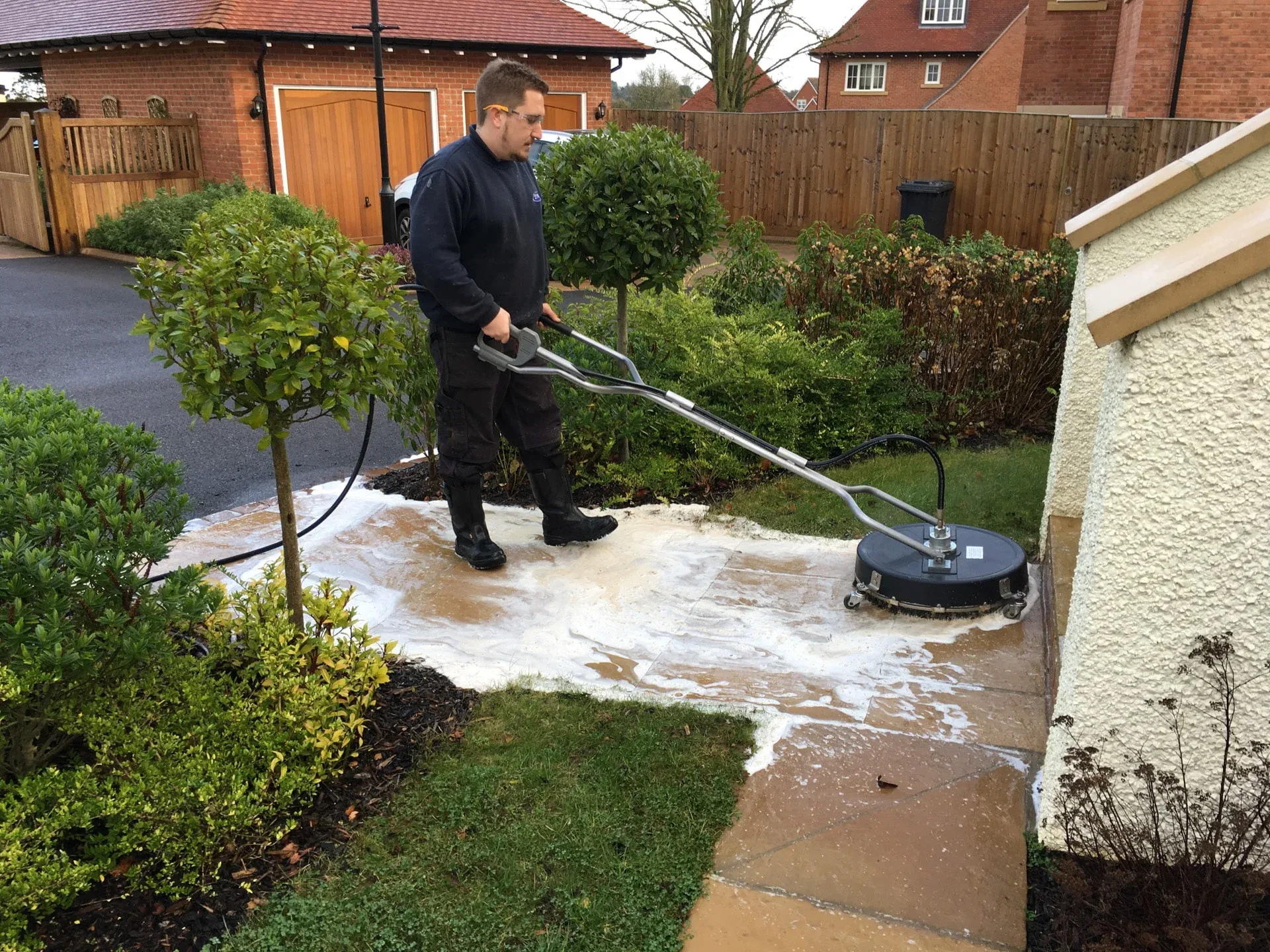Professional patio cleaning in progress